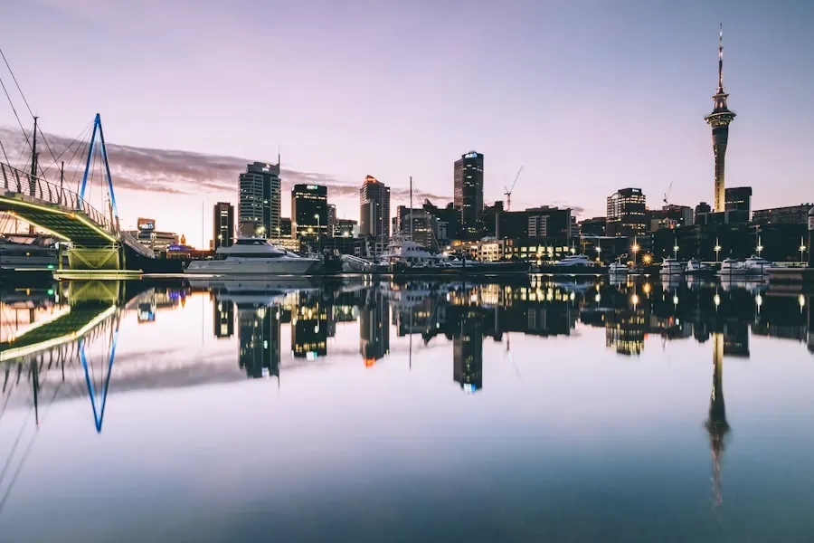 Auckland skyline and Sky Tower reflected in the harbour