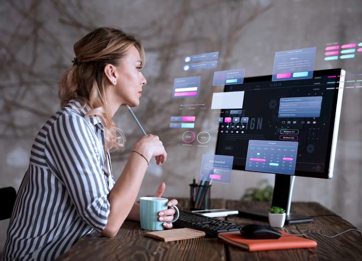 Marketer reviewing ad campaign dashboards and performance charts